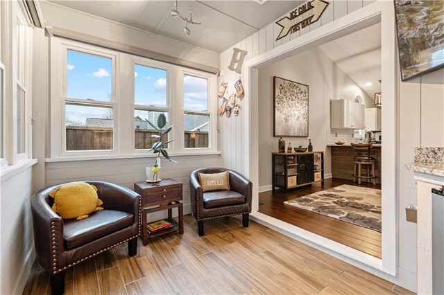 sitting room with wood finished floors