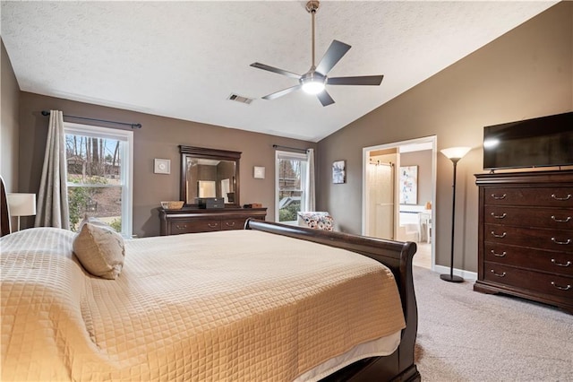 bedroom featuring light carpet, multiple windows, visible vents, and lofted ceiling