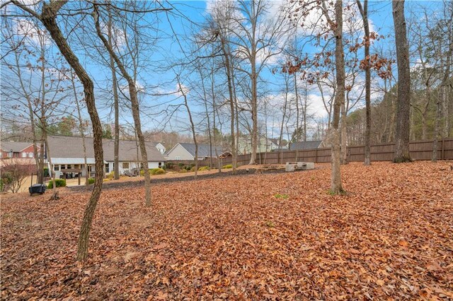 view of yard with fence