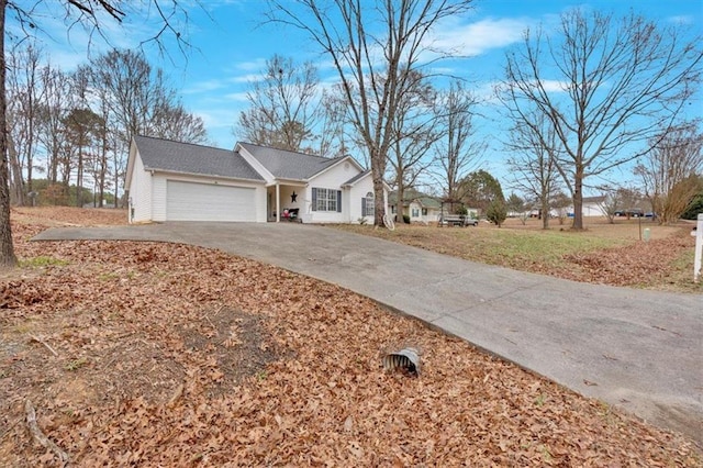 ranch-style house featuring a garage