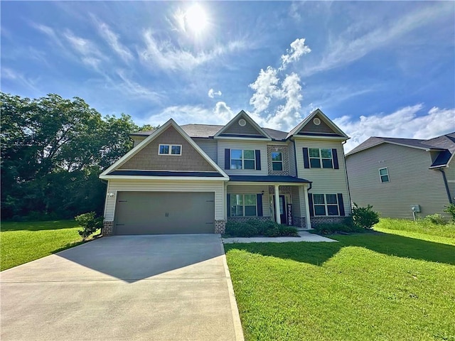 360 Walker Rd, Byron, GA 31008 - view of front facade featuring driveway, a front lawn, and an attached garage