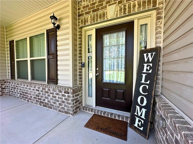 360 Walker Rd, Byron, GA 31008 - property entrance with covered porch and brick siding