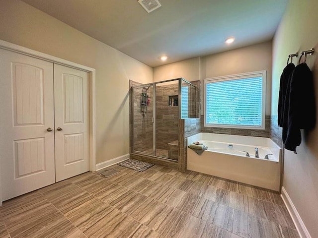 360 Walker Rd, Byron, GA 31008 - full bath with a garden tub and a shower stall