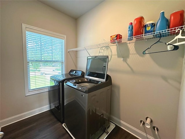 360 Walker Rd, Byron, GA 31008 - laundry room featuring washing machine and dryer and dark wood finished floors