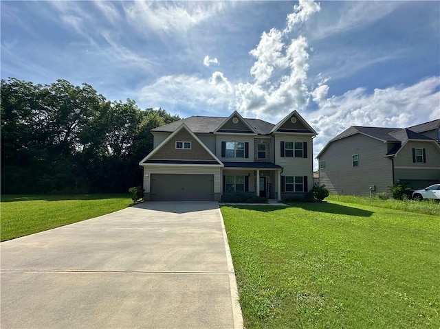 360 Walker Rd, Byron, GA 31008 - view of front of house featuring concrete driveway, a front lawn, an attached garage, and stone siding