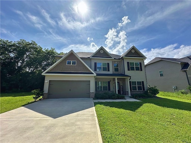 360 Walker Rd, Byron, GA 31008 - view of front of house with driveway, a front lawn, and a garage