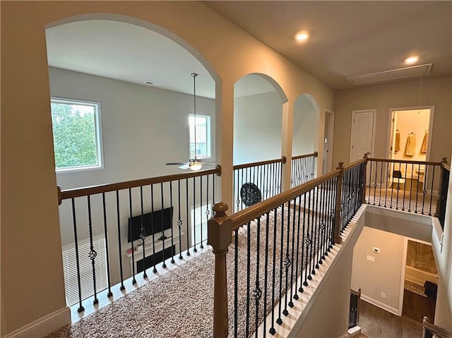 360 Walker Rd, Byron, GA 31008 - hallway with attic access, recessed lighting, an upstairs landing, and arched walkways