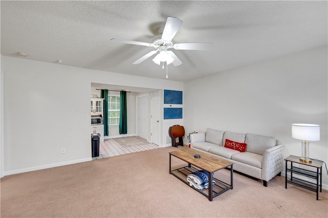33 Middlebrook Dr, Cartersville, GA 30120 - carpeted living area featuring a ceiling fan, baseboards, and a textured ceiling