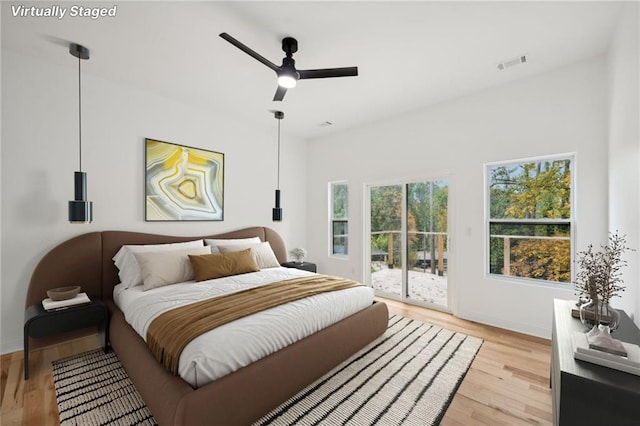 unfurnished room featuring ceiling fan and light wood-type flooring