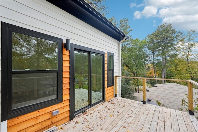 view of side of property featuring central air condition unit and a patio area