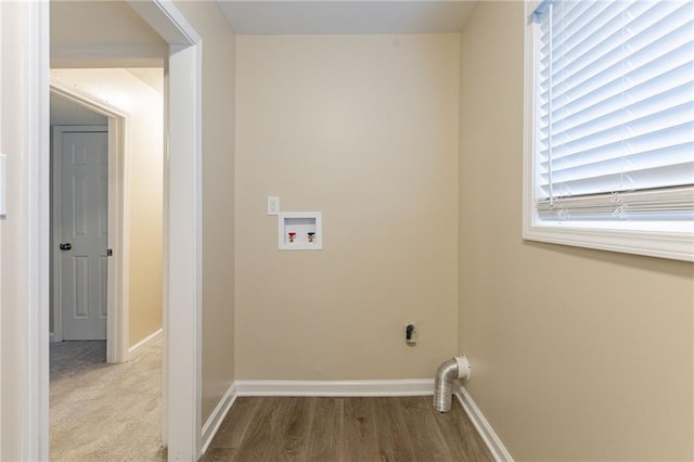 laundry area with hookup for a washing machine, wood-type flooring, and hookup for an electric dryer