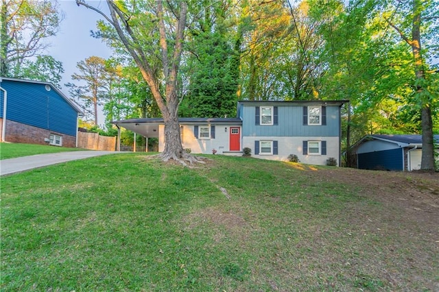2046 Copperfield Cir, Decatur, GA 30035 - tri-level home featuring fence, an outbuilding, driveway, a carport, and a front yard