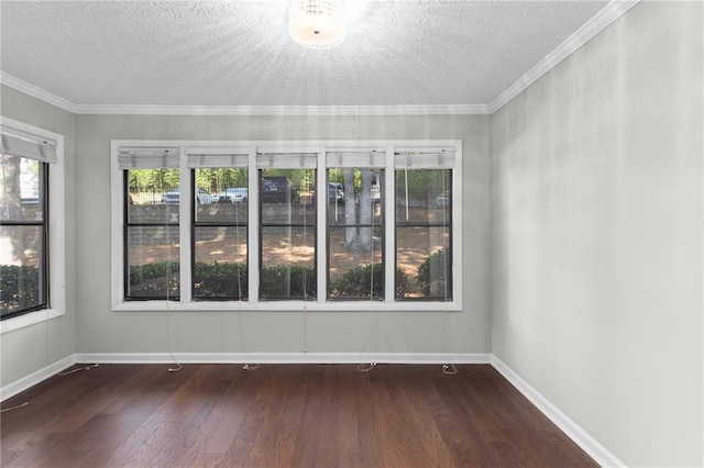 603 Summit N Dr NE Unit 603, Atlanta, GA 30324 - empty room with wood finished floors, baseboards, a textured ceiling, and ornamental molding