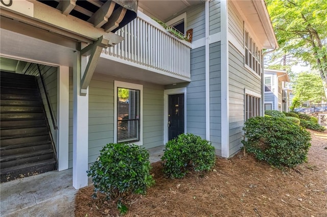 603 Summit N Dr NE Unit 603, Atlanta, GA 30324 - view of exterior entry with a balcony