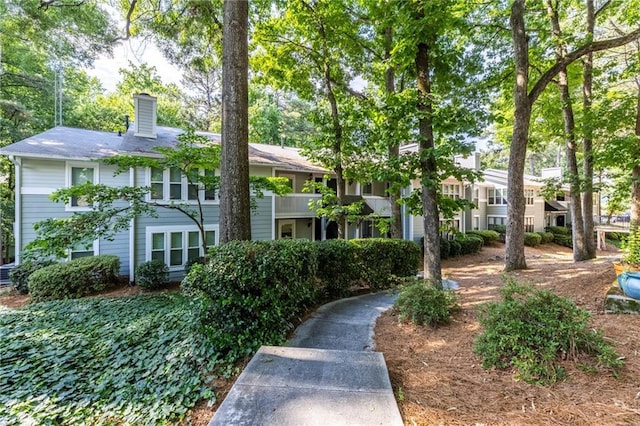 603 Summit N Dr NE Unit 603, Atlanta, GA 30324 - view of front of house featuring a chimney and a residential view
