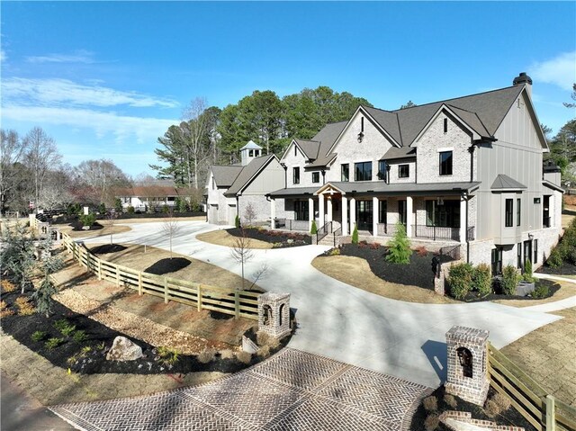 view of front of property featuring a front yard and a garage