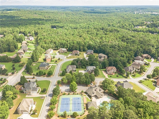 3202 Lucky Pl, Conyers, GA 30013 - aerial view of residential area featuring a forest