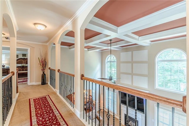 3202 Lucky Pl, Conyers, GA 30013 - hall featuring beamed ceiling, crown molding, coffered ceiling, carpet floors, and arched walkways