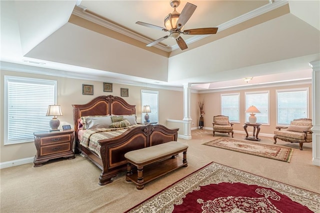 3202 Lucky Pl, Conyers, GA 30013 - carpeted bedroom featuring ornamental molding, decorative columns, a raised ceiling, multiple windows, and ceiling fan