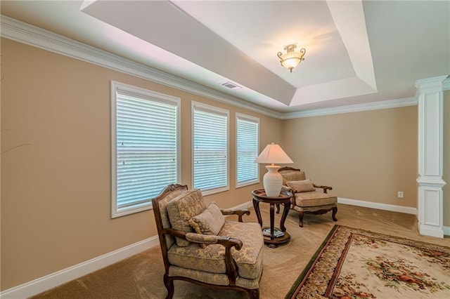 3202 Lucky Pl, Conyers, GA 30013 - sitting room featuring ornate columns, a raised ceiling, carpet flooring, and crown molding