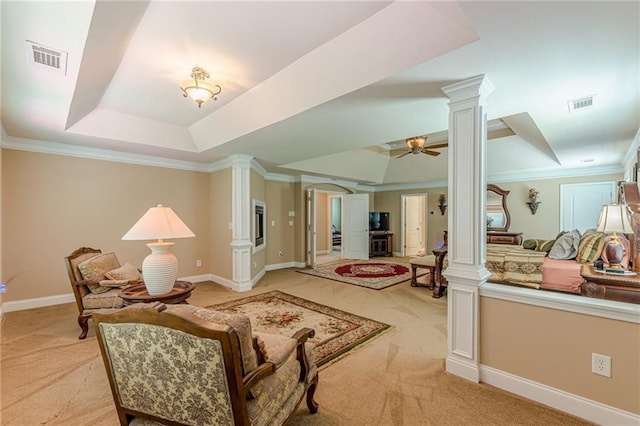 3202 Lucky Pl, Conyers, GA 30013 - living area with ornate columns, light carpet, a raised ceiling, ceiling fan, and crown molding