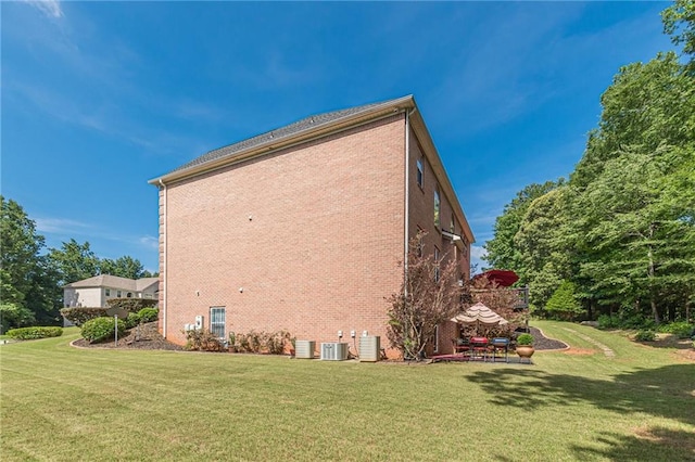 3202 Lucky Pl, Conyers, GA 30013 - view of side of property with brick siding and a yard