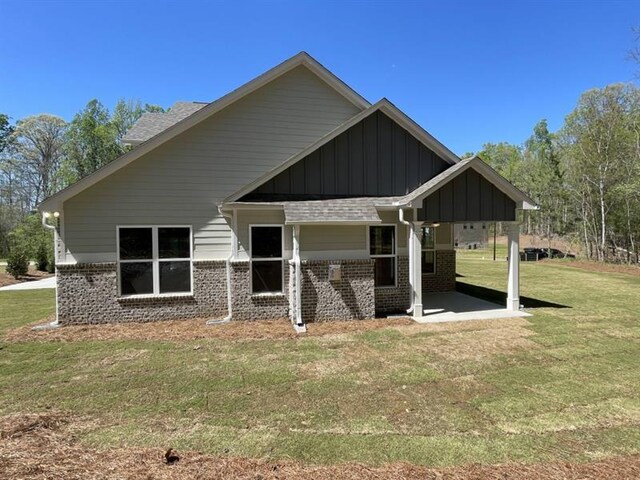 view of home's exterior featuring a lawn