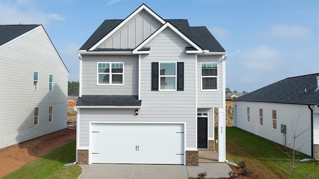 craftsman house with a garage