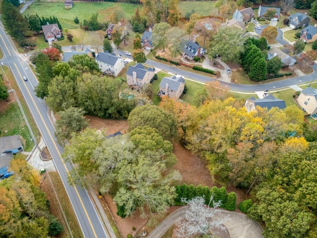 aerial overview of property's location featuring nearby suburban area