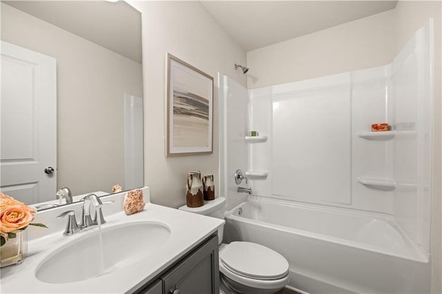 full bathroom with vanity,  shower combination, and toilet