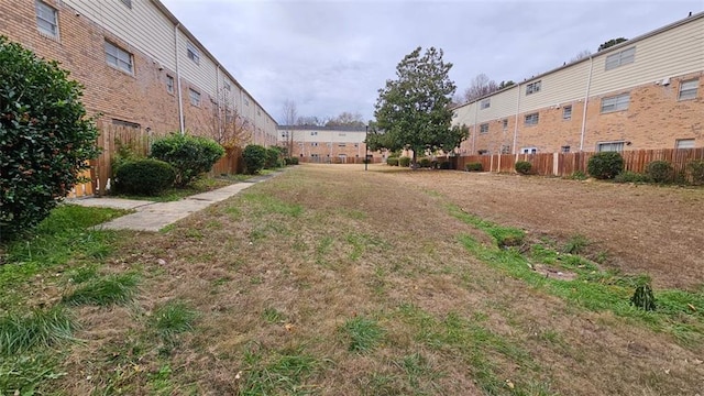 view of yard featuring fence