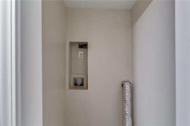 washroom with electric dryer hookup, laundry area, and washer hookup