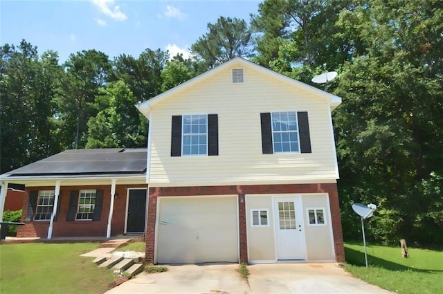 2172 Cold Springs Cir, Lithonia, GA 30058 - traditional home with covered porch, driveway, solar panels, a garage, and a front yard