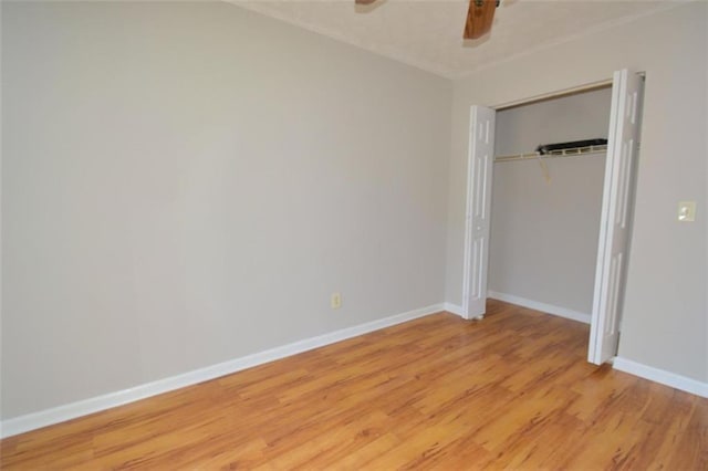 2172 Cold Springs Cir, Lithonia, GA 30058 - unfurnished bedroom featuring light wood-style flooring, a closet, and a ceiling fan