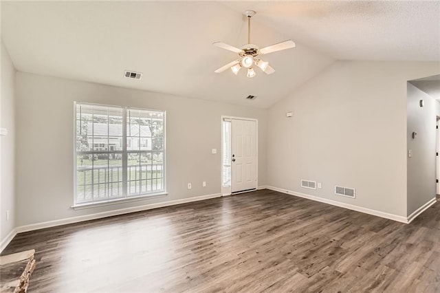 230 Belmont Trl, Covington, GA 30016 - unfurnished living room featuring a ceiling fan, wood finished floors, and lofted ceiling