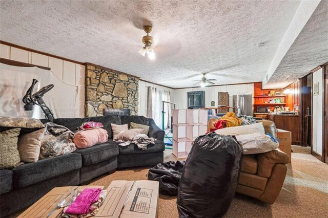 270 Oak Ridge Rd, Covington, GA 30016 - living room with ornamental molding, light carpet, a textured ceiling, and ceiling fan