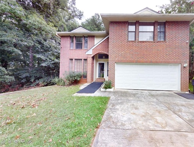 view of front of house with a garage and a front lawn