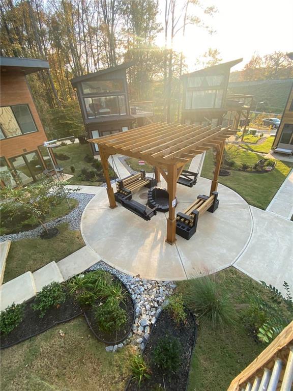 view of property's community with an outdoor hangout area