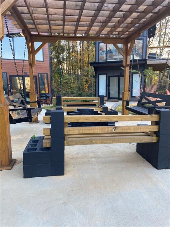 view of patio featuring a pergola