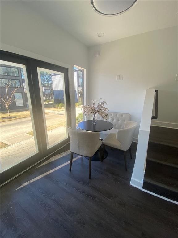 dining area featuring dark hardwood / wood-style flooring