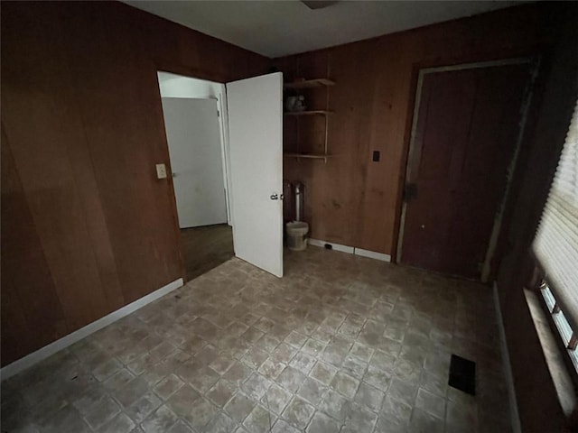 15 Liberty St, Gainesville, GA 30501 - unfurnished bedroom featuring wooden walls