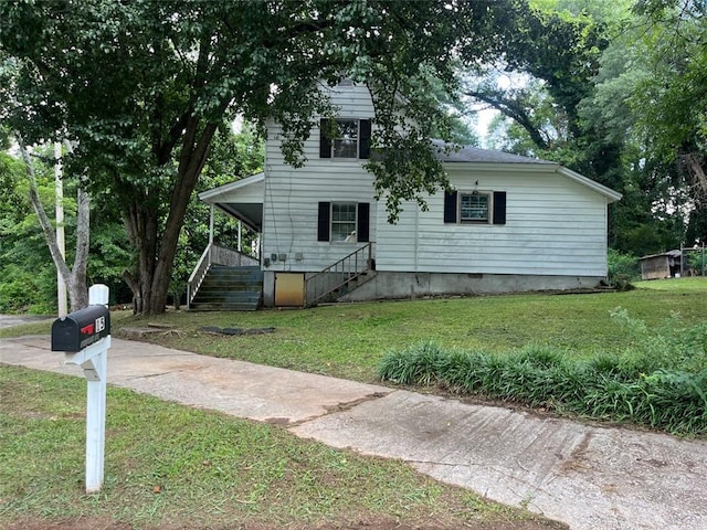 15 Liberty St, Gainesville, GA 30501 - view of front of property with a front yard, stairway, and crawl space