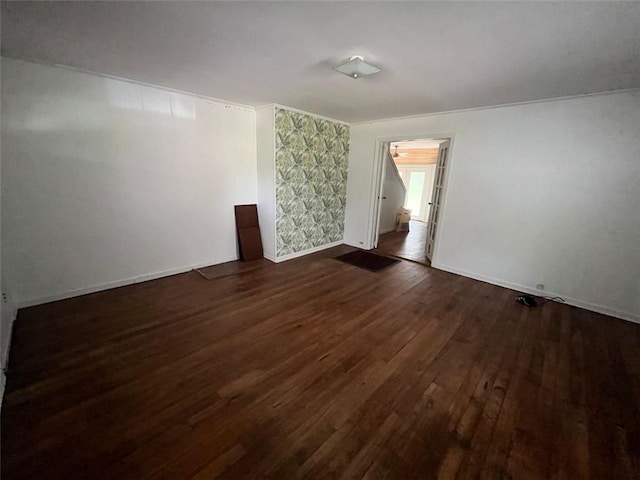 15 Liberty St, Gainesville, GA 30501 - empty room with dark wood-style floors and baseboards