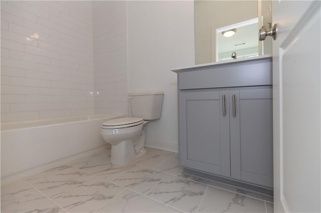 full bathroom featuring toilet, tiled shower / bath combo, and vanity