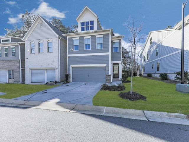 view of front of house with a front yard, concrete driveway, brick siding, and a garage