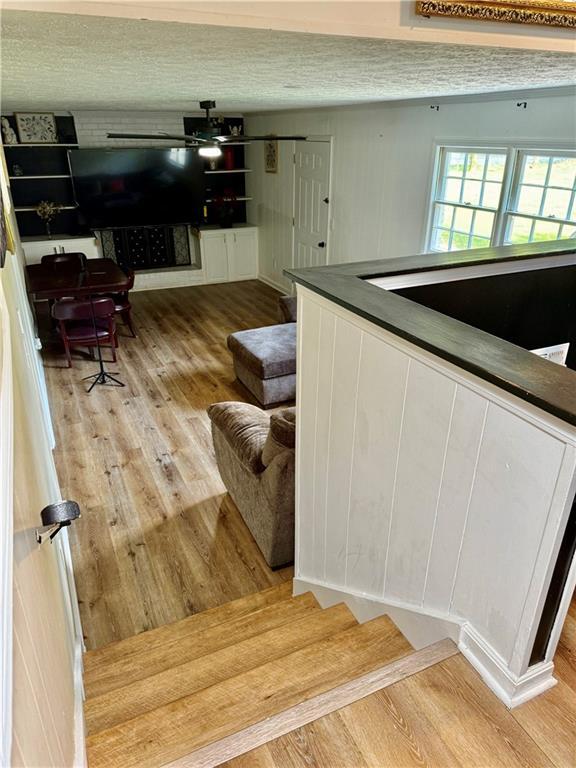 5347 Ocarol Ct, Stone Mountain, GA 30088 - living area featuring light wood-type flooring and stairs