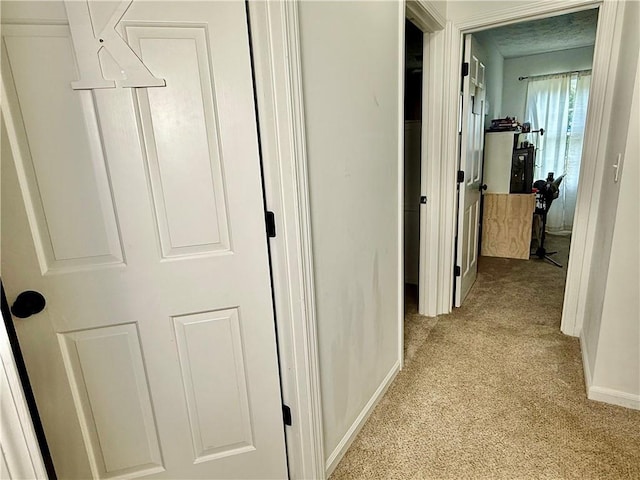 5347 Ocarol Ct, Stone Mountain, GA 30088 - hallway with light colored carpet and baseboards