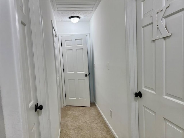 5347 Ocarol Ct, Stone Mountain, GA 30088 - hallway with light carpet and baseboards