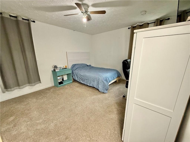 5347 Ocarol Ct, Stone Mountain, GA 30088 - carpeted bedroom with a textured ceiling and a ceiling fan