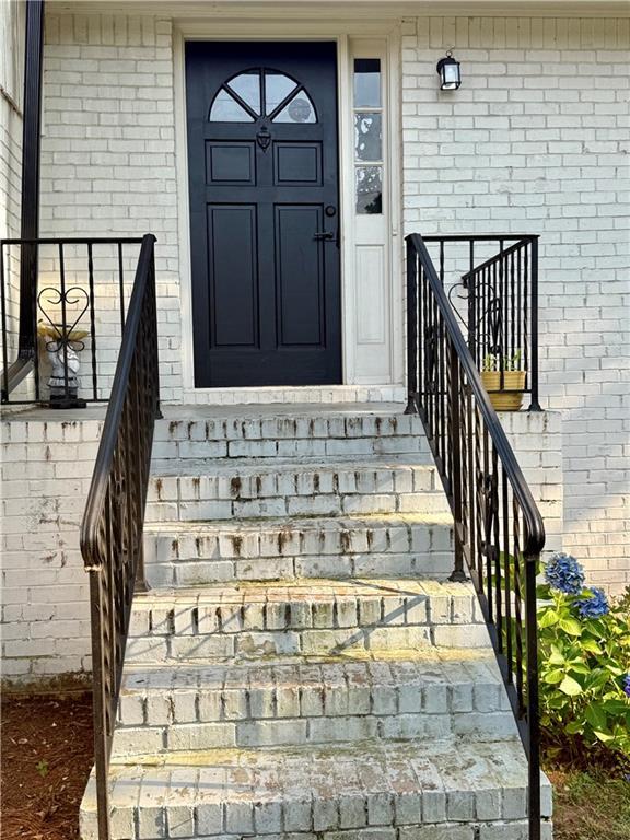 5347 Ocarol Ct, Stone Mountain, GA 30088 - entrance to property featuring brick siding
